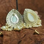 Golden Dangler Stud Earrings With Monalisa Stone