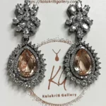 Pink Ruby Zircon Earrings by Kalakriti Gallery